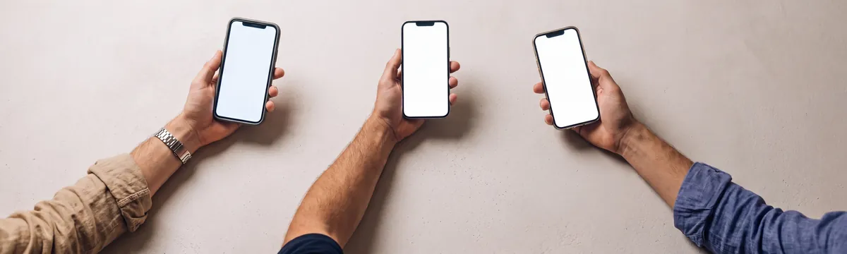 Three hands on one pale surface: the owner setting Ester's personality on one phone, a staff member and a guest on WhatsApp on the other two, and no dashboard anywhere.